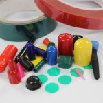 A table with many different colored objects on it